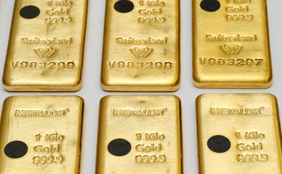 Gold prices edged lower on Monday near their lowest level in 2 weeks touched in the previous session as an elevated US dollar continued to pressure demand for greenback-priced bullion. 