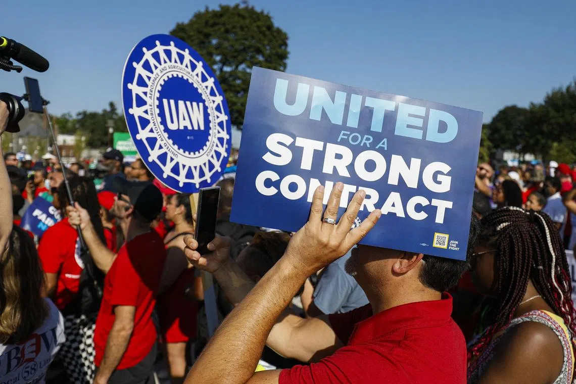 United Auto Workers union members gather for a rally on Sep 4. The union is in contract negotiations with Ford, General Motors, and Stellantis. The current UAW contract expires on Sep 14.
