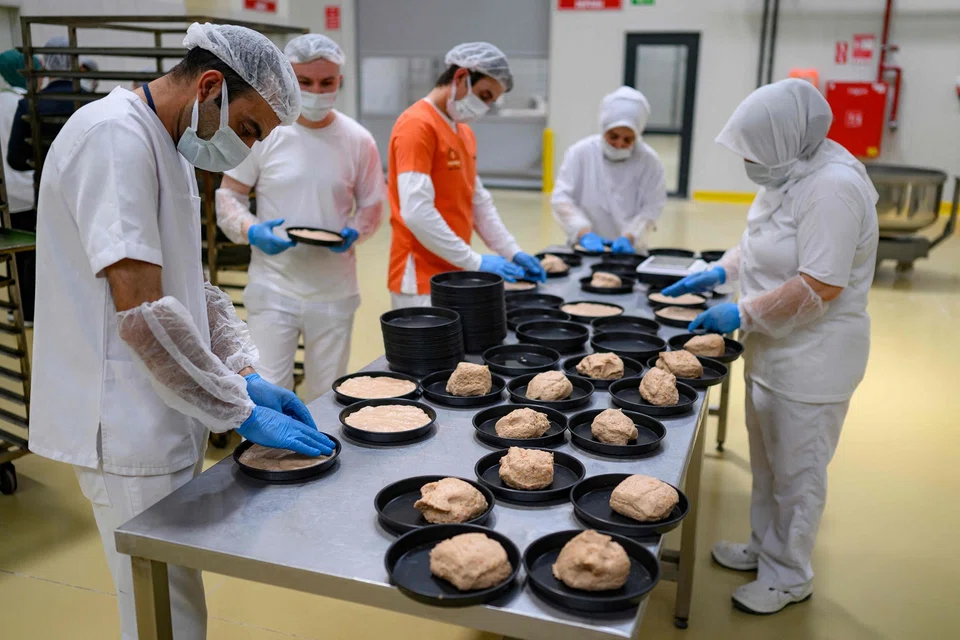 At the Halk Ekmek, bakery employees have been shaping 300 loaves of Kulluoba by hand every day.