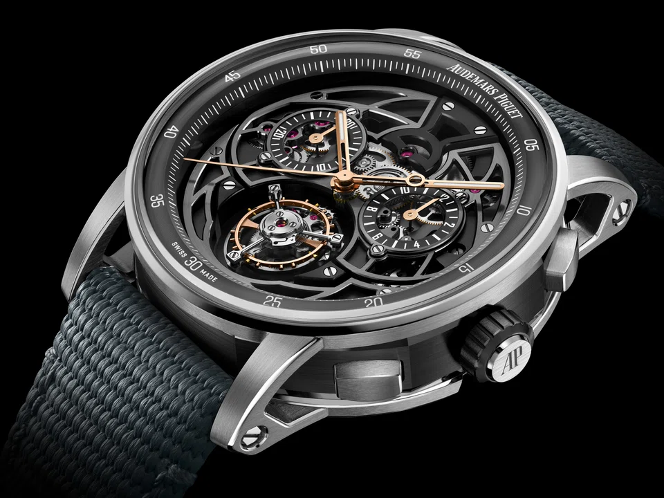The structured lines of Audemars Piguet's Code 11.59 Self-winding Flying Tourbillon Chronograph reveal a richly detailed mechanism in shades ranging from light grey to black.