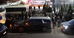Vehicles believed to be of investigators from the Corruption Investigation Office for High-ranking Officials arriving at the impeached South Korea President Yoon's official residence.   