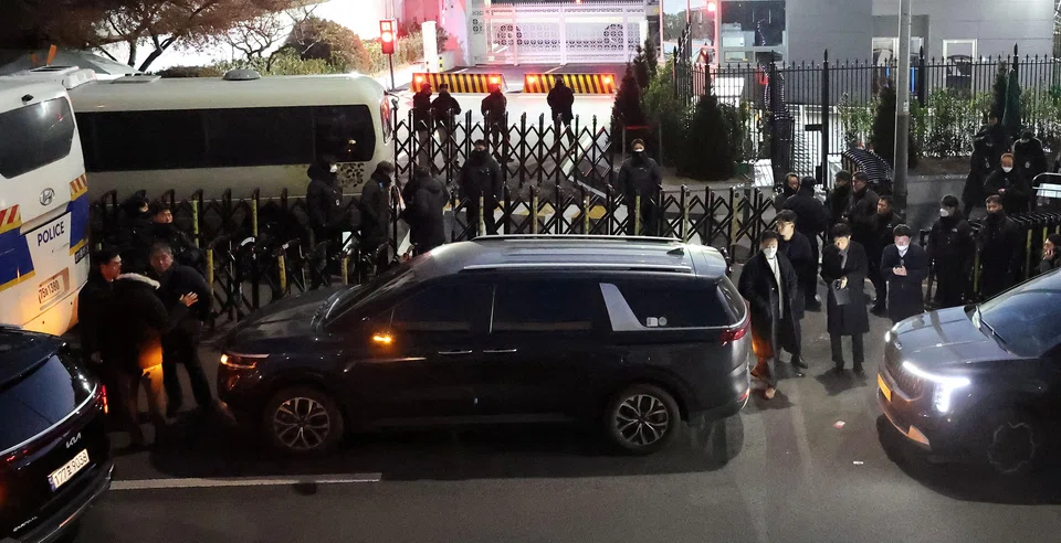 Vehicles believed to be of investigators from the Corruption Investigation Office for High-ranking Officials arriving at the impeached South Korea President Yoon's official residence.   
