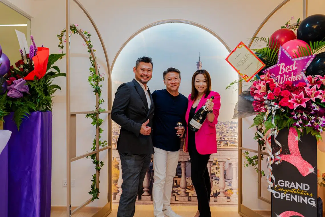 Group general manager Sean Mak (far left) and CEO Elayne Soh (far right) celebrating the opening of Beyond Medical Group's new clinic, Alpha Asia Aesthetics, along with its interior designer Kenneth Ng, director of Watermark Interior Design.