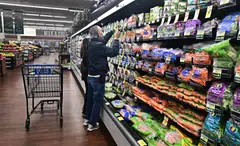 Customers at a supermarket in California. The inflation that has plagued the US has come substantially from supply-side factors or shocks hampering the economy’s ability to churn out goods. 