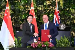 Prime Minister Lawrence Wong (left) and Prime Minister of New Zealand Christopher Luxon signing the Singapore - New Zealand CSP at The Pavilion, Government House Auckland in New Zealand on Oct 10.