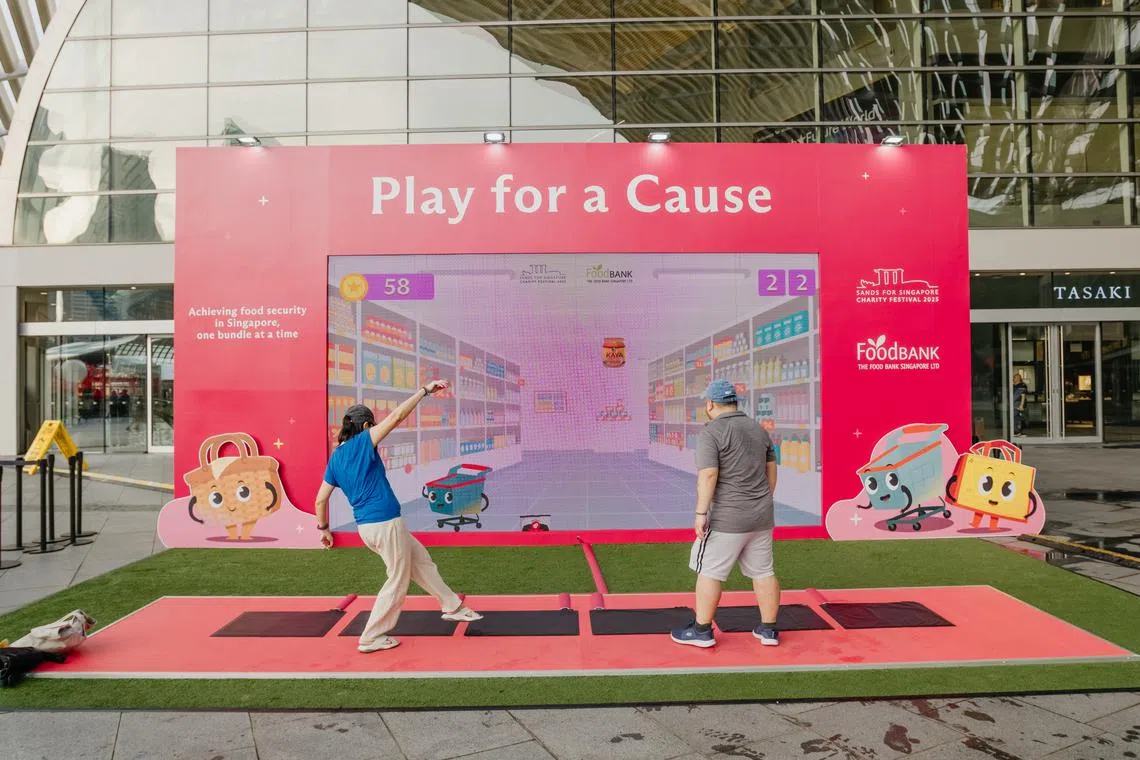 Play for a Cause is a life-sized digital game, where players catch falling food items which will form virtual food bundles.