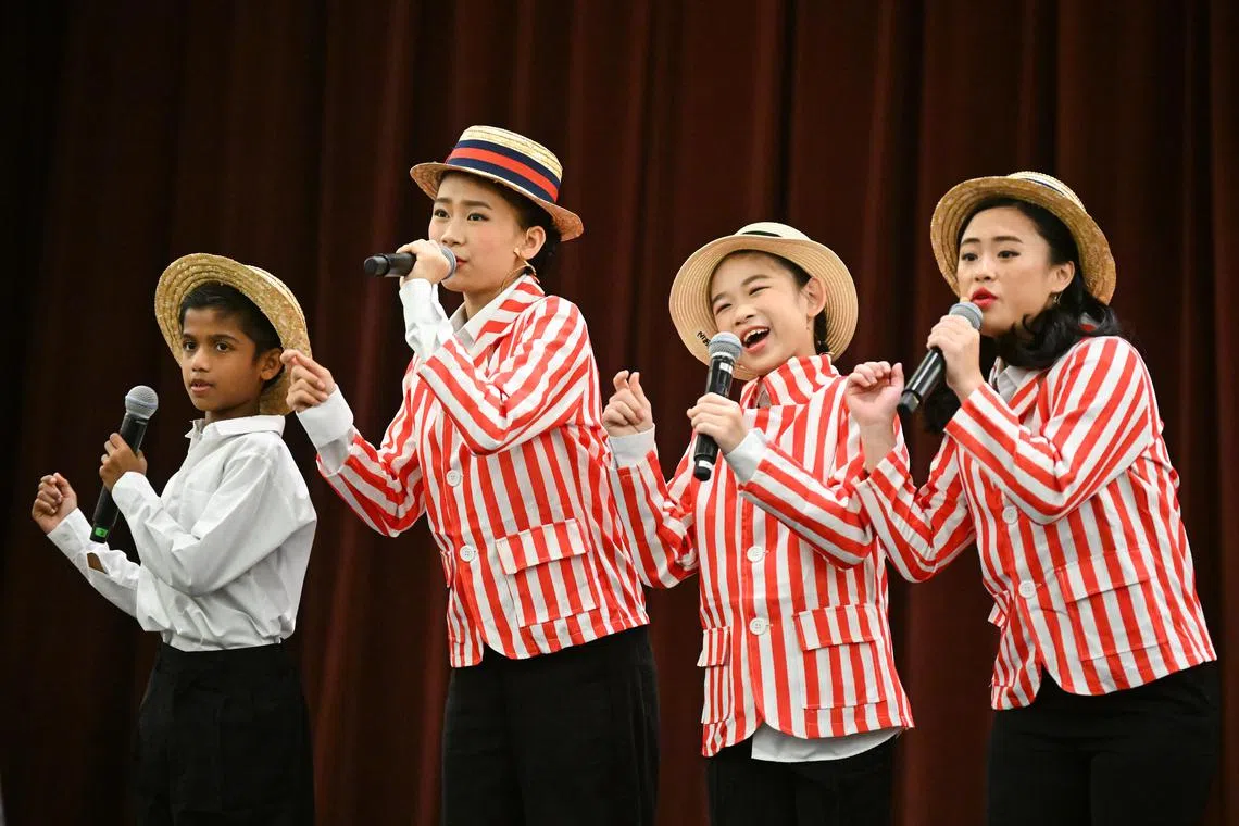 Kids in 1930s-inspired costumes performing a medley at the ChildAid dress rehearsal. 