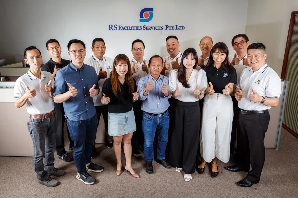 The RS Facilities Services team, led by director Michelle Yap (front row, third from left) and operations director Tay Chin Chye (front row, fourth from right).