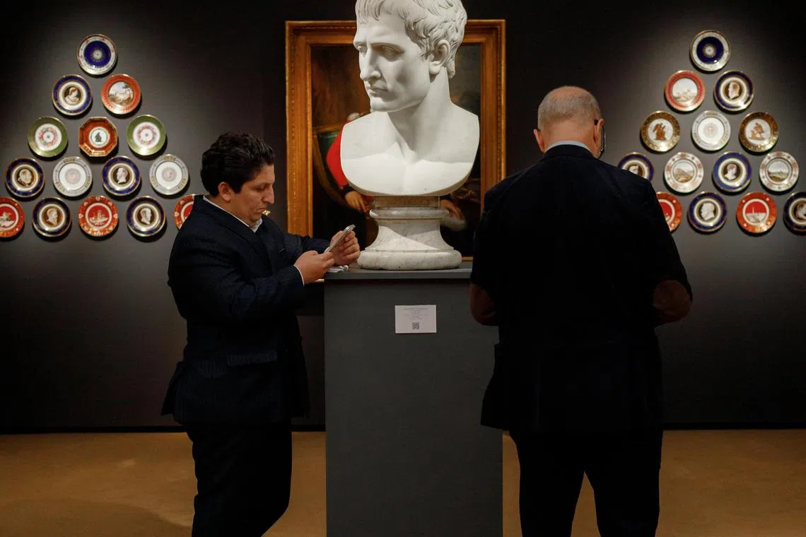 Visitors at Frieze Masters, which is devoted to pre-21st century artworks, in Regent's Park, London, on Oct 9, 2024. 