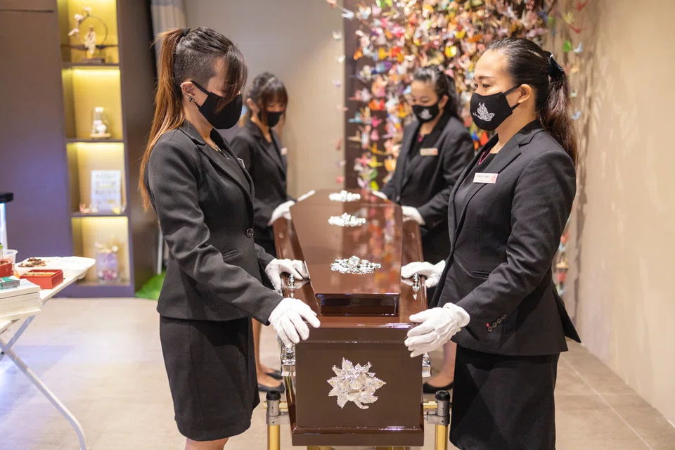 Pallbearers preparing for the departed's final set-off in Showers of Love Sanctuary at The Life Celebrant.