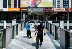 By law, outdoor work is supposed to be limited to less than six hours when temperatures cross 37 deg C and suspended when it hits 40 deg C.