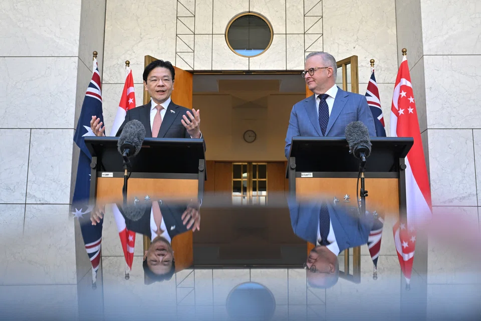 The world is becoming more uncertain and unsettled, but Australia and Singapore share “a common strategic perspective that is built on a deep reservoir of trust”, says Singapore's Prime Minister Lawrence Wong (left) at a joint press conference in Canberra with Australian Prime Minister Anthony Albanese.
