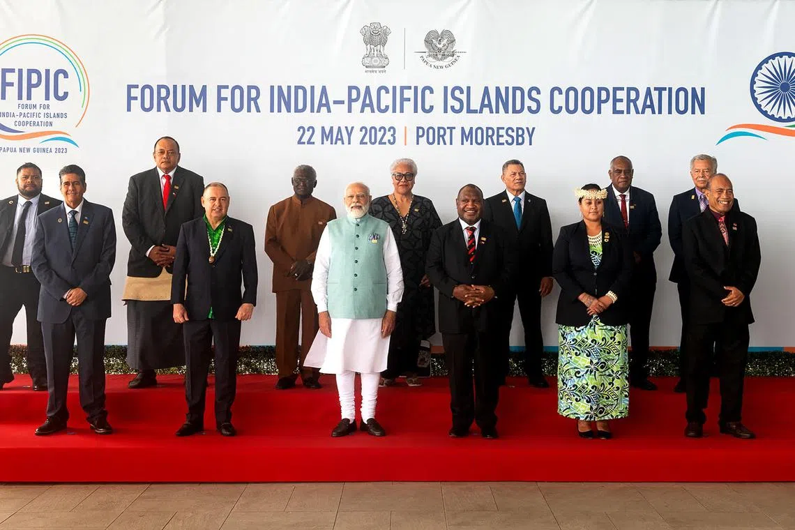 Papua New Guinea's Prime Minister James Marape (fourth from right), India’s Prime Minister Narendra Modi (fourth from left) and leaders posing for a group photo during the Forum for India-Pacific Islands Cooperation in Port Moresby. Papua New Guinea, May 22, 2023.
