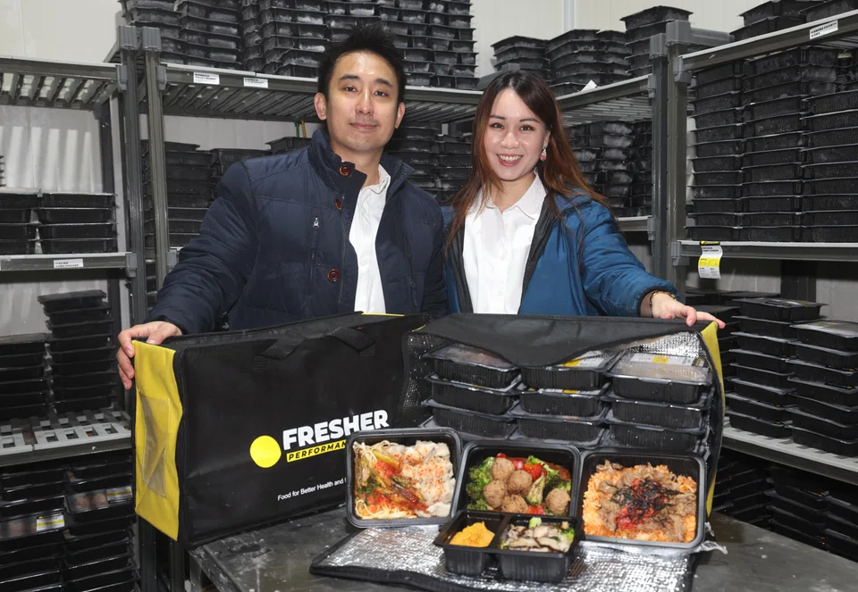 Jerome Seow (left) and Claire Francis, co-founders of Fresher Performance Meals. The home-grown meal prep services provider has seen sales grow more than 50 per cent annually since 2019.
