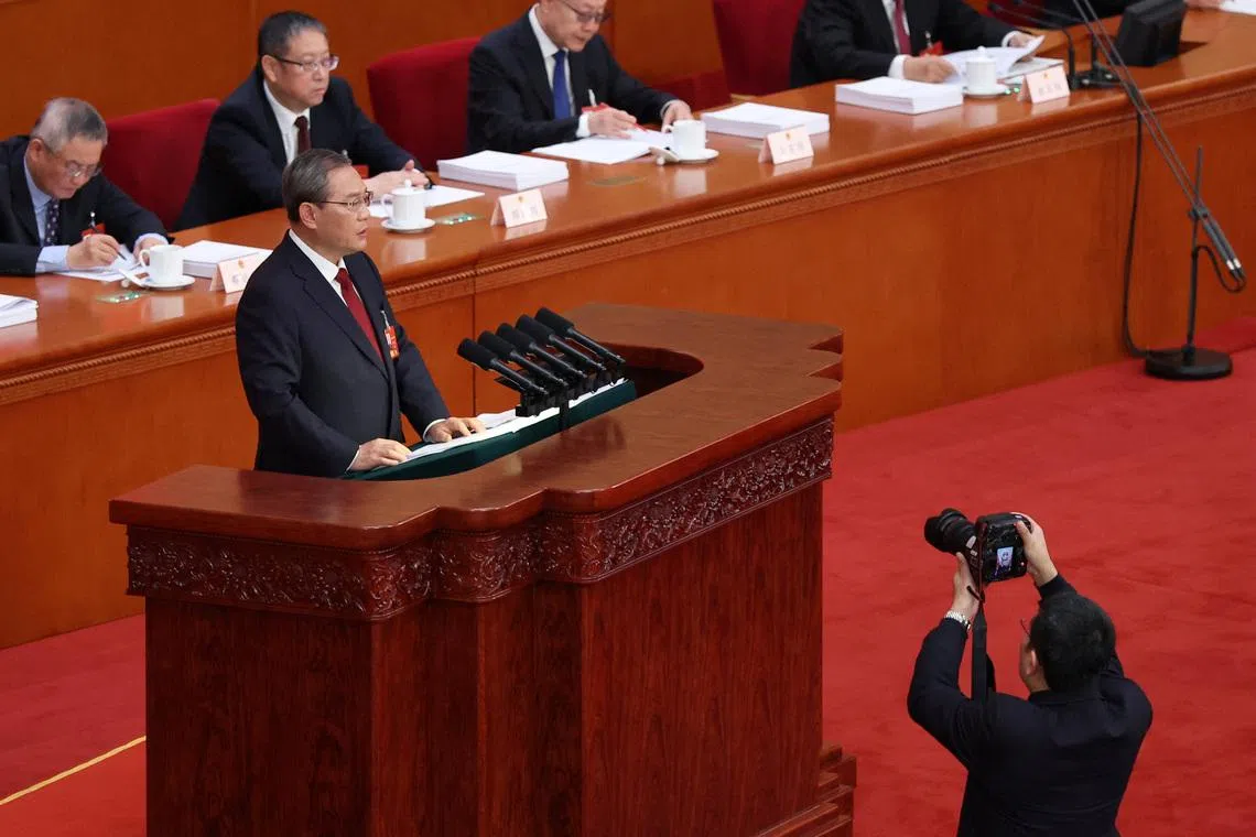 Chinese Premier Li Qiang unveiled a broader GDP growth forecast of 4.5 to 5% at the opening of the parliament's annual meeting.