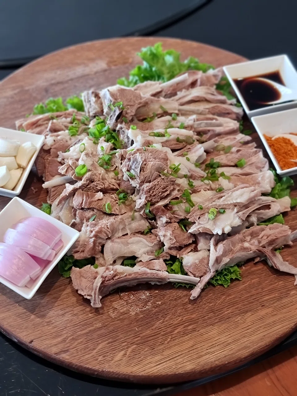 Ningxia lamb is sliced and served cold with a vinegar dip.