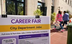 (FILES) People arrive at a career fair where job seekers can meet  with prospective employers during a City of Los Angeles career fair offering to fill vacancies in more than 30 classifications of jobs on November 2, 2023 in Los Angeles, California. US job growth surged unexpectedly in December, government data showed on January 5, 2024, wrapping up a solid year for the labor market even as voters remain gloomy about the economy ahead of November's presidential election. The US added 216,000 jobs in the final month of 2023 despite expectations of a slowdown from the prior month, according to Department of Labor data. (Photo by Frederic J. BROWN / AFP)
