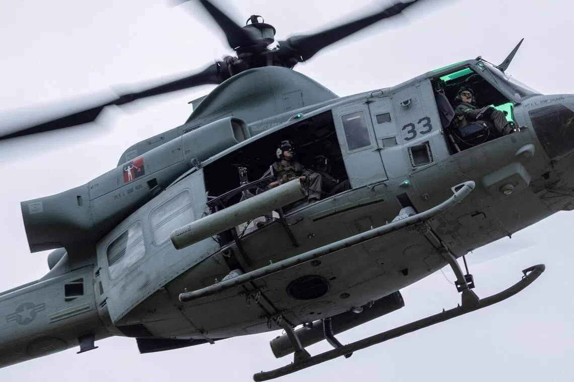 A US Marine Corps UH-1Y Venom helicopter in training in Humacao, Puerto Rico, Jan 5, 2026. President Trump and the Pentagon have criticised the defence industry for what they say are high costs and slow production.