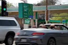 US petrol prices reached a record high on Tuesday, as President Joe Biden said fighting inflation is his top domestic priority.
