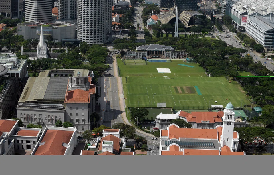The old City Hall (left) and the Padang (right), with other historical buildings around, on 7 April 2021.