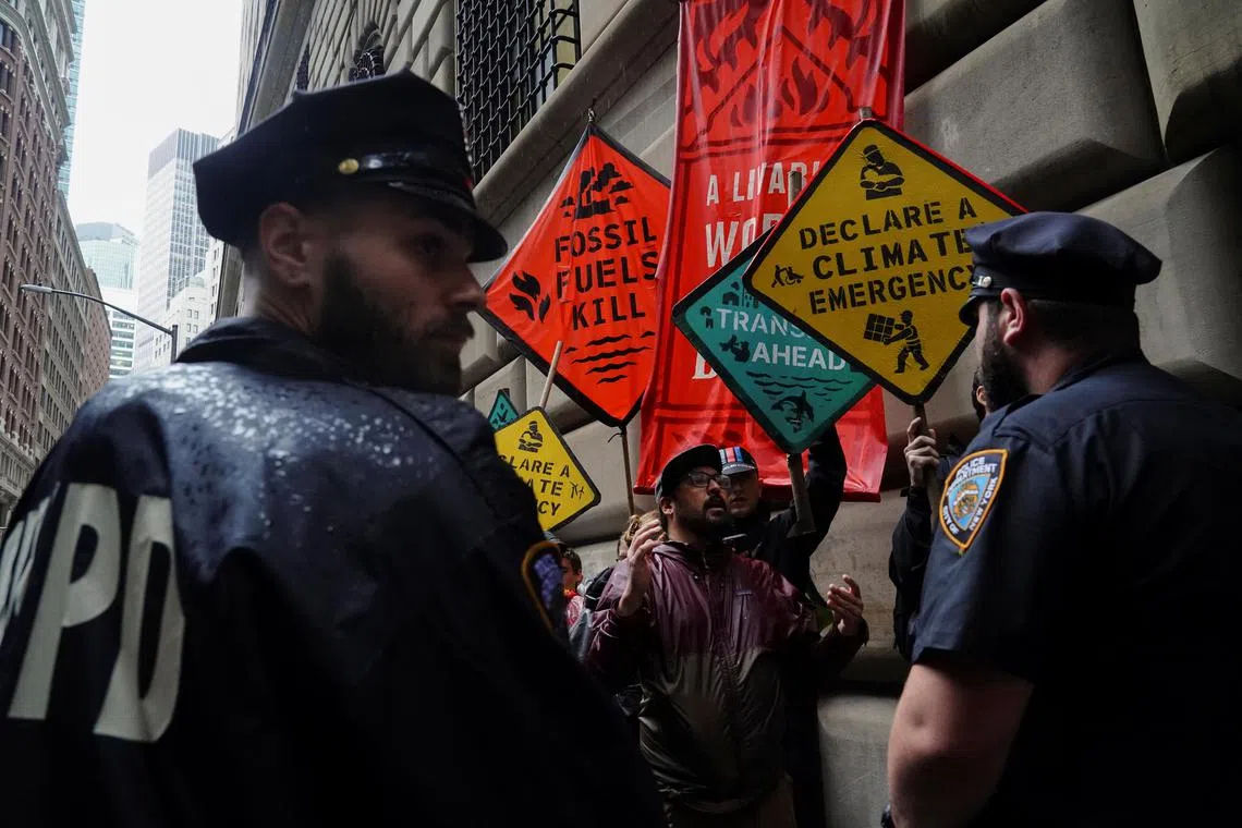 Climate protestors in New York City during Climate Week in September. The idea that environmental goals can be aligned with economic growth is losing favour among researchers.