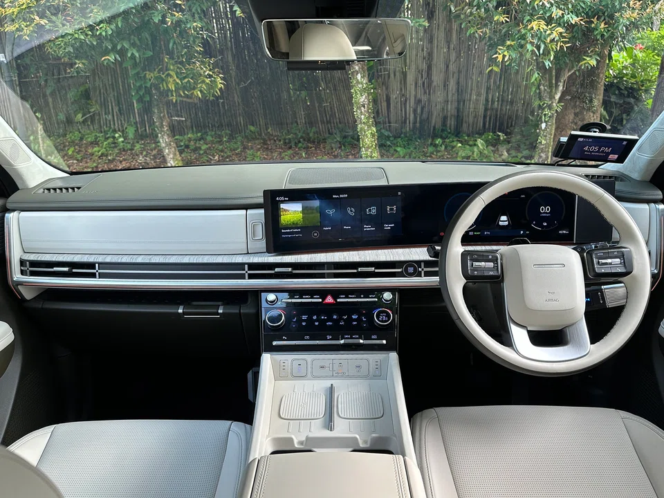 The airy interior boasts soft Nappa leather everywhere, with digital screens to make things feel modern, along with a bank of switches to make everything easy to operate.