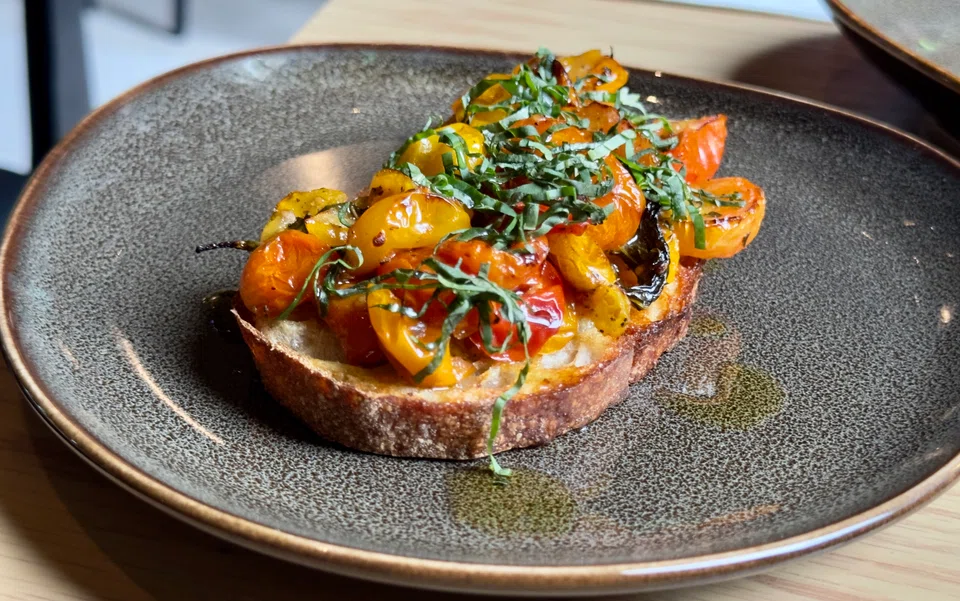 Crunchy toasted sourdough topped with roasted cherry tomatoes.