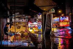 A flooded street in Bangkok. Sizable investments are needed to create sustainable infrastructure in Asian cities, which face the threat of climate change-related flooding.