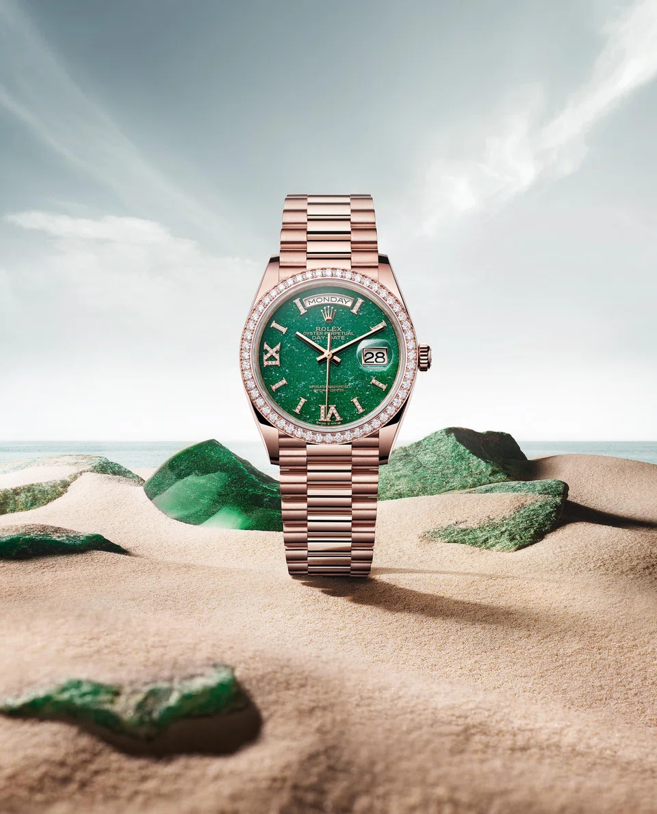 This Oyster Perpetual Day-Date 36 in Everose gold with a green aventurine dial features 32 diamonds on the hour markers.