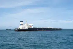 Indonesian authorities are attempting to pump out the oil from a supertanker that ran aground in Indonesian waters just off Singapore. 