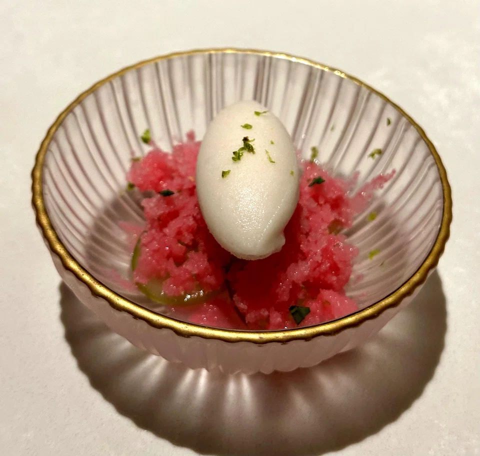 Pre-dessert of soursop sorbet and rose granita.