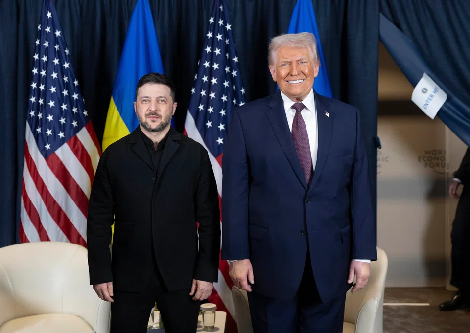 (From left) Ukraine's President Volodymyr Zelensky with US President Donald Trump during their meeting on the sidelines of the World Economic Forum, Davos, Switzerland, Jan 22, 2026. 