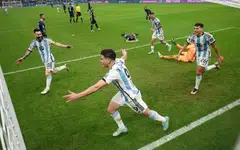 Argentina's Julian Alvarez celebrates scoring their second goal with Lionel Messi, Rodrigo De Paul and Nahuel Molina as Croatia's Dominik Livakovic and teammates look dejected, Lusail Stadium, Lusail, Qatar, Dec 13, 2022