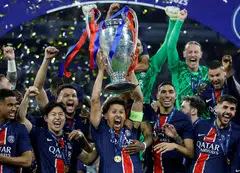 PSG captain Marquinhos lifts the trophy after leading the team to a 5-0 win over Inter in the Champions League final in Munich.