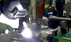 The occupations on the list are: cooks in Indian restaurants; food processing workers; sheet metal workers; welders and flame cutters; metal moulders and core makers; riggers and cable splicers; and structural metal preparers and erectors.