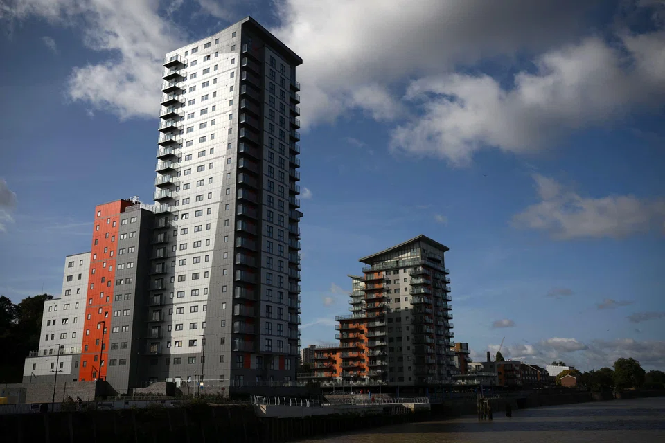 Greenwich Council has ordered Comer Homes Group, the developer of Mast Quay Phase II development in Woolwich (top), to demolish two apartment blocks over breaches of planning conditions. 