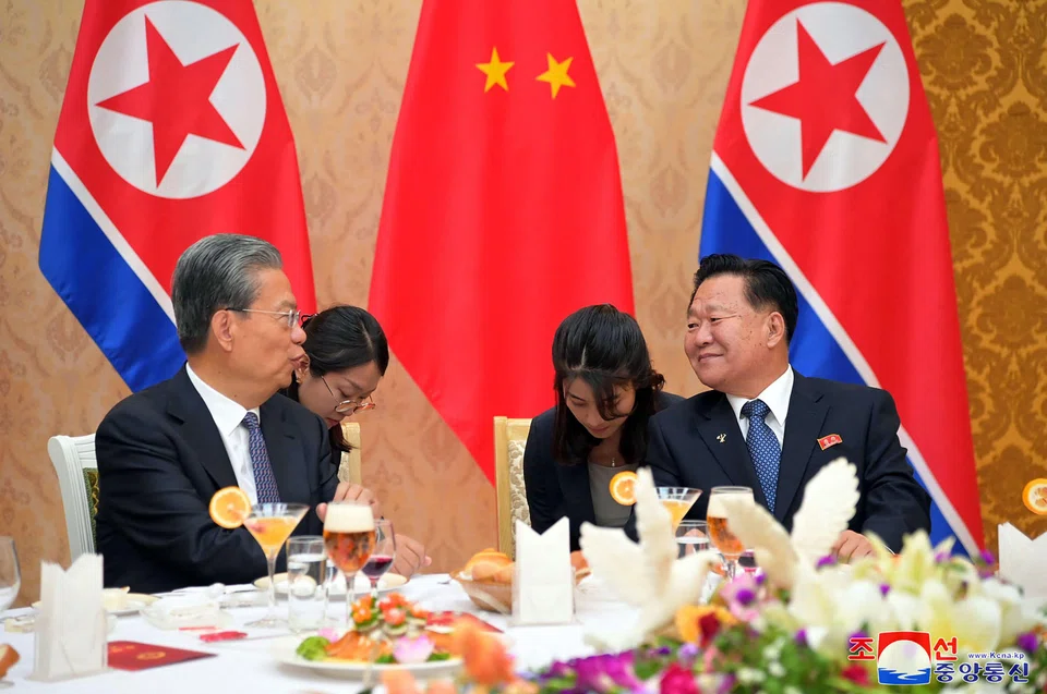 (From left) China's top lawmaker Zhao Leji chatting with Choe Ryong Hae, chairman of North Korea's Standing Committee of the Supreme People's Assembly, during a banquet in Pyongyang, North Korea, April 11, 2024.