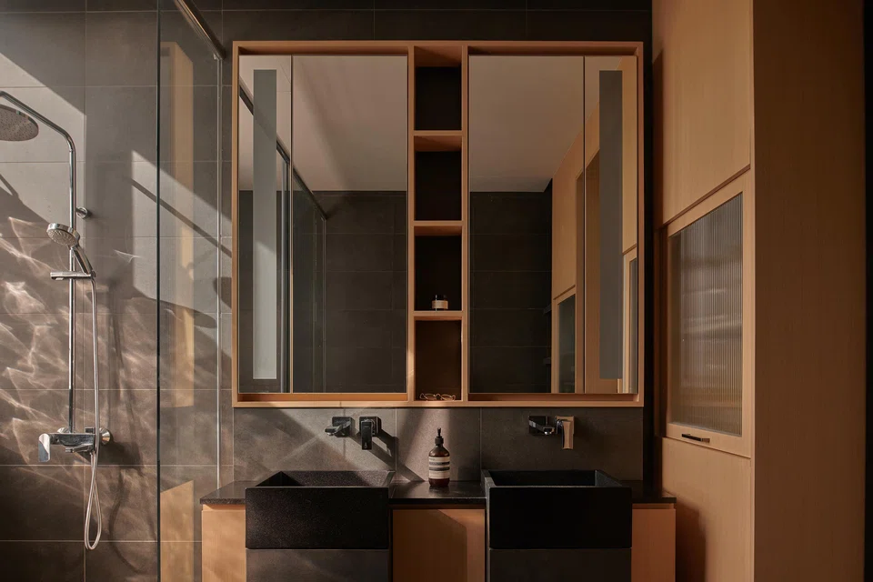 Plentiful storage was incorporated into the master bathroom. 