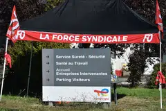 A banner for the Force Ouvriere (FO), the Totalenergies Carling’s trade unionists, hangs at the entrance to the petrochemical site of Carling, north-eastern France on Sept27, 2022, as workers demand an increase in wages, an unwinding of profit-sharing, the resumption in hiring. 