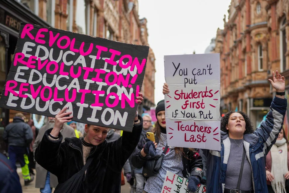 A joint strike action by train drivers, teachers, university staff and civil servants, in Leeds, UK, on Feb 1, 2023. A large-scale walkout by government workers is now planned for April 28, the culmination of a month of proposed industrial unrest.