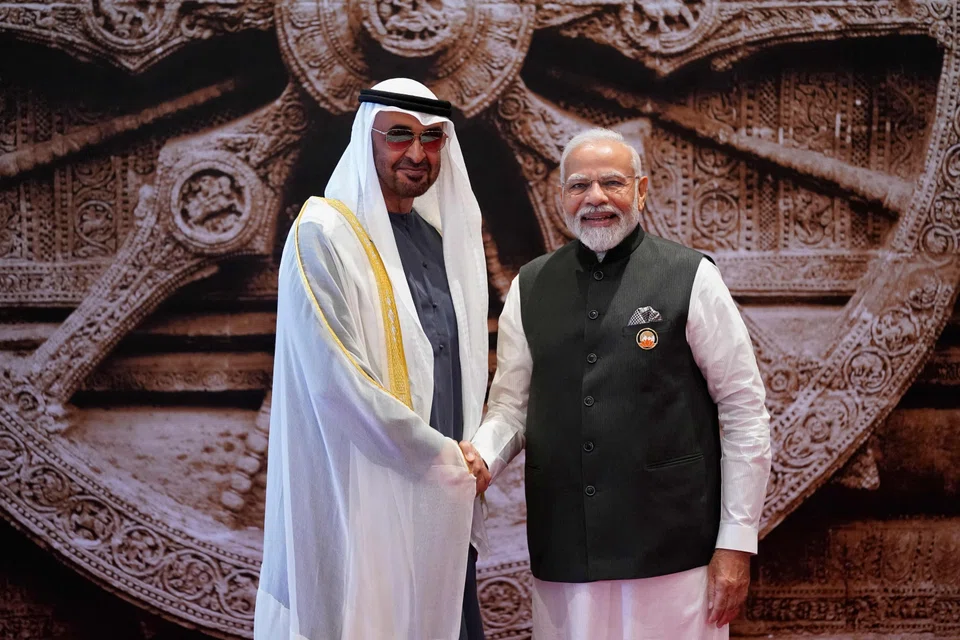 India's Prime Minister Narendra Modi (right) shakes hand with United Arab Emirates President Sheikh Mohamed bin Zayed Al-Nahyan. UAE investments would help Modi highlight his efforts to bolster the economy ahead of the 2024 vote