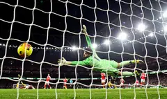Arsenal's goalkeeper David Raya watches haplessly as Manchester United's Matheus Cunha scores the team's third goal at the Emirates stadium, London, Britain, Jan 25, 2026.