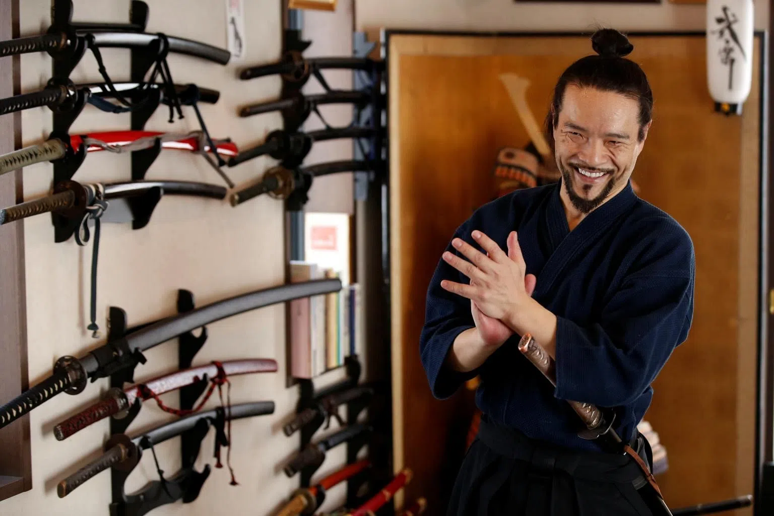 Samurai dance teacher moves online as Tokyo Olympics bans foreign