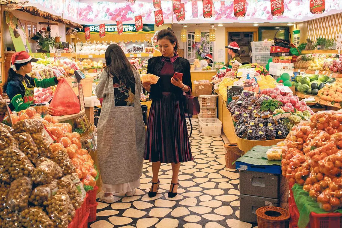 Customers dine in a restaurant in Batangas City, Philippines. The central bank governor Benjamin Diokno is optimistic that the country will post an even better performance following a solid rebound last year.