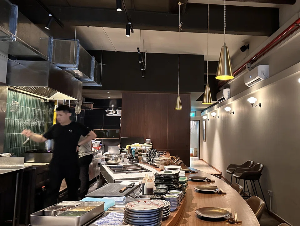 Hearth's dim but cosy, unpretentious interiors.