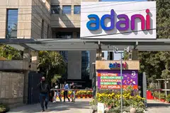 Adani's shares climbed 5.1 per cent after the earnings were announced which showed gross debt paring to 383.2 billion rupees from 410 billion rupees last year.