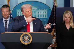 US President Donald Trump gestures as he speaks about Javelin anti-tank missiles next to US Defence Secretary Pete Hegseth (left) and US Attorney General Pam Bondi (right) during a press conference about deploying federal law enforcement agents in Washington to bolster the local police presence, Washington D.C., Aug 11, 2025. 