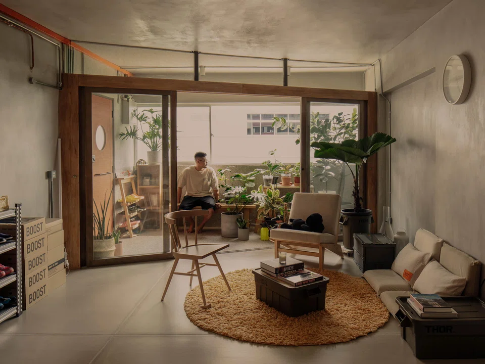 Architect Melvin Keng in his patio just behind his front door.