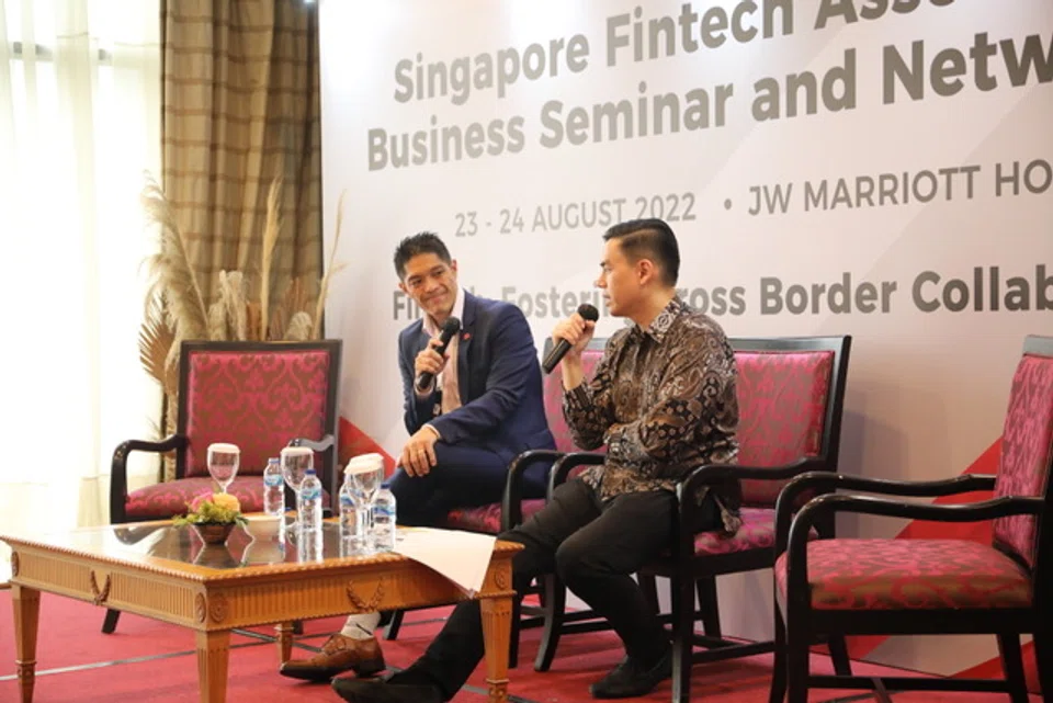Singapore Fintech Association chief operating officer Reuben Lim (left) with Indonesian Fintech Association deputy secretary-general Alwin Jabarti at a business seminar in Jakarta in August 2022.