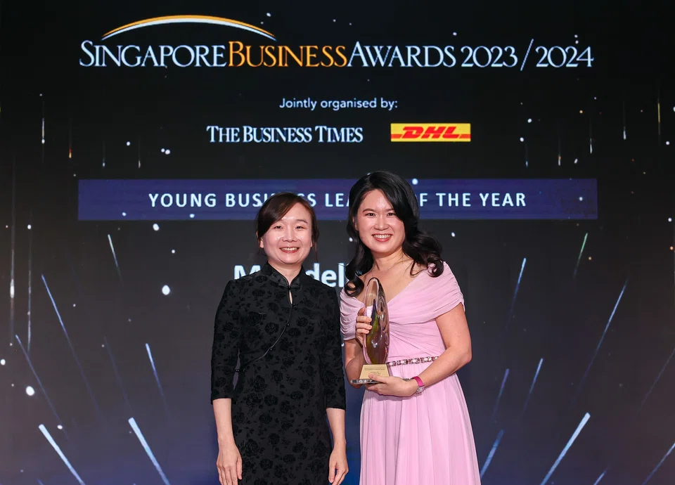 Chen Huifen (left) editor, The Business Times, and Adeline Sim, chief corporate officer, HRnet Group (Young Business Leader of the Year).